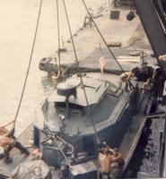 Hoisting an armored Alpha boat